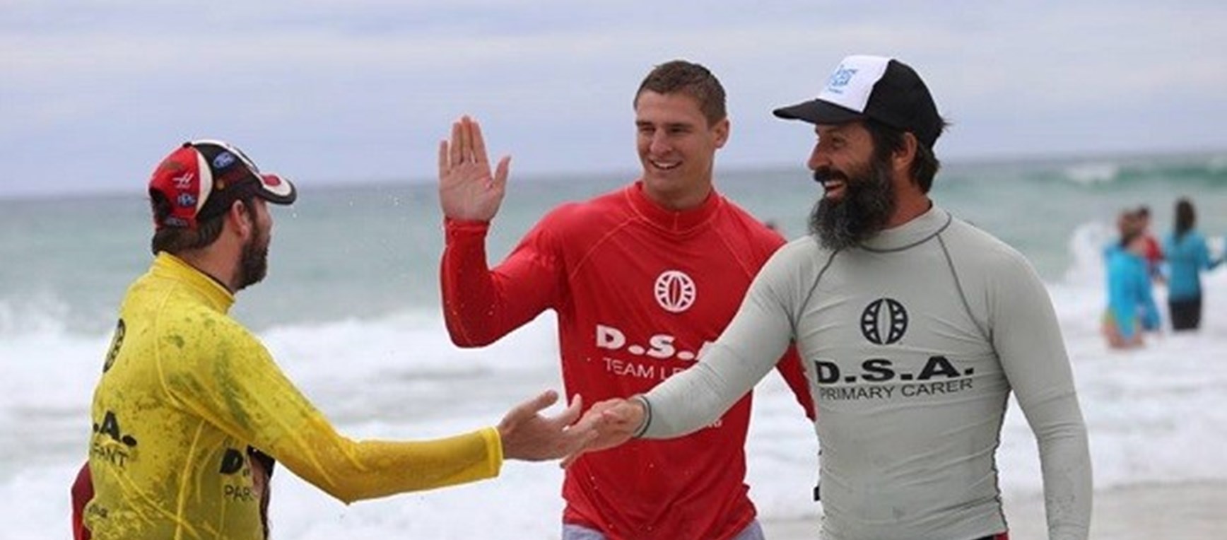 Titans players continue support for Disabled Surfers Association