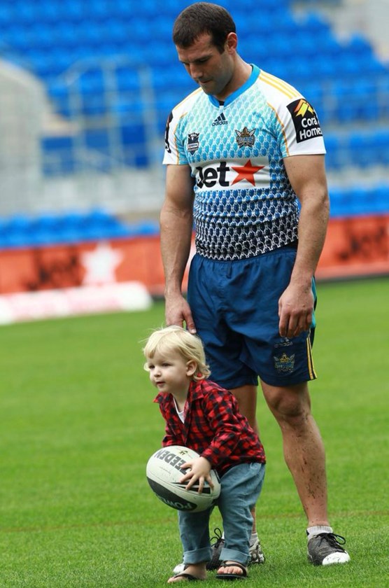 Fynn with his father Anthony, who played 102 games for the Titans between 2007-11.