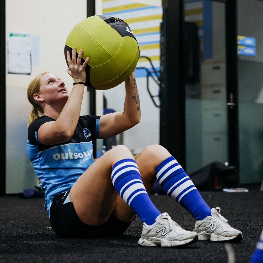 Lailani Montgomery proudly wearing Tugun Seahawks socks.