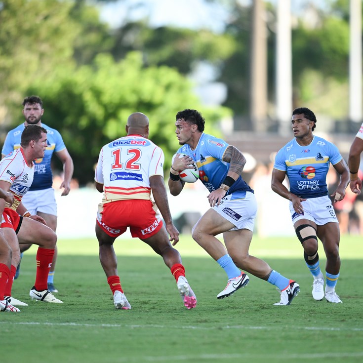 Young Titans fall after determined challenge