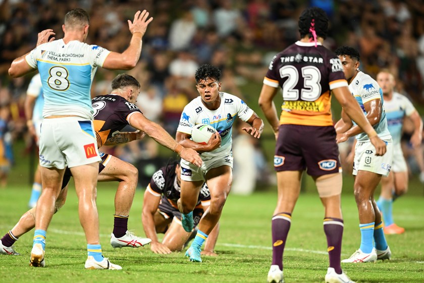 Keano Kini in action for the Titans against the Broncos. Photo: Zain Mohammed / NRL Images