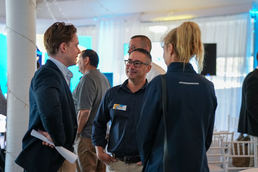 Gold Coast Titans partnerships manager Joseph Wood, Neumann Steel sales manager Ross Cook and general manager Kathy Bartley.