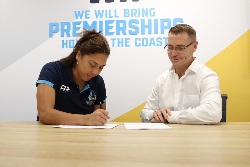 The powerhouse prop signing her contract extension alongside Titans CEO Steve Mitchell.