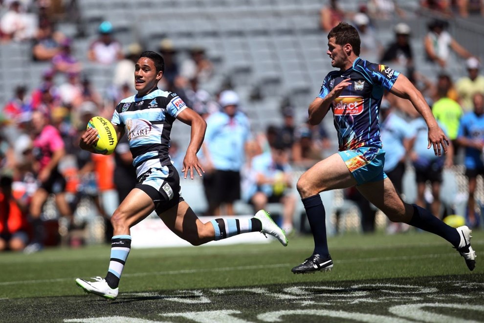 Valantine Holmes of the Sharks sprints away to score on day two of the Dick Smith NRL Auckland Nines rugby league tournament at Eden Park in Auckland on 16 February 2014. Photo: www.photosport.co.nz