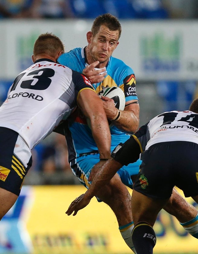 ASHLEY HARRISON - NRL ROUND 4 -  GOLD COAST TITANS V NTH QUEENSLAND COWBOYS AT CBUS SUPER STADIUM, 31sth MARCH 2014. This image is for Editorial Use Only. Any further use or individual sale of the image must be cleared by application to the Manager Sports Media Publishing (SMP Images). PHOTO : CHARLES KNIGHT - SMP IMAGES 