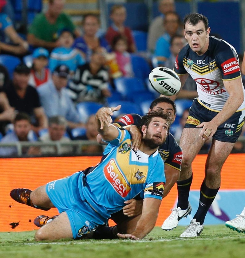 DAVE TAYLOR - NRL ROUND 4 -  GOLD COAST TITANS V NTH QUEENSLAND COWBOYS AT CBUS SUPER STADIUM, 31sth MARCH 2014. This image is for Editorial Use Only. Any further use or individual sale of the image must be cleared by application to the Manager Sports Media Publishing (SMP Images). PHOTO : CHARLES KNIGHT - SMP IMAGES 