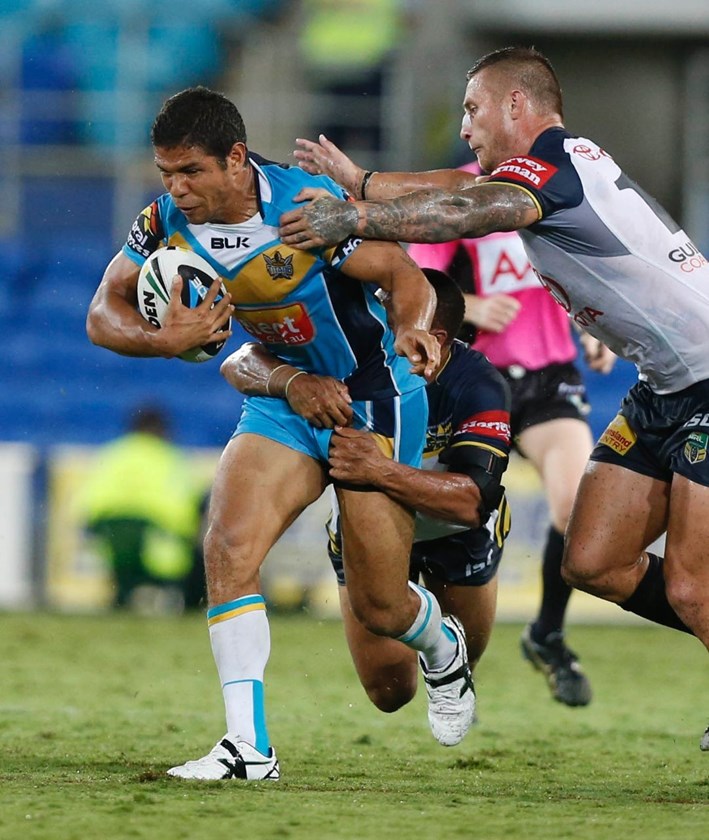 DAVID MEAD - NRL ROUND 4 -  GOLD COAST TITANS V NTH QUEENSLAND COWBOYS AT CBUS SUPER STADIUM, 31sth MARCH 2014. This image is for Editorial Use Only. Any further use or individual sale of the image must be cleared by application to the Manager Sports Media Publishing (SMP Images). PHOTO : CHARLES KNIGHT - SMP IMAGES