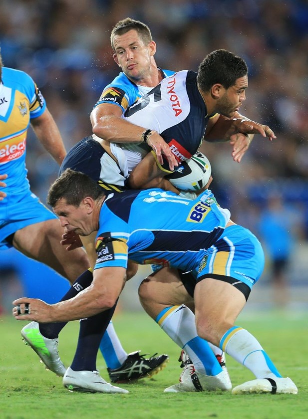 ASHLEY HARRISON - GOLD COAST TITANS v NORTH QUEENSLAND COWBOYS - 31ST March 2014, Action from the National Rugby League (NRL) played at Cbus Super Stadium on the Gold Coast. This image is for Editorial Use Only. Any further use or individual sale of the image must be cleared by application to the Manager Sports Media Publishing (SMP Images). NO UN AUTHORISED COPYING : PHOTO SMP IMAGES/GOLD COAST TITANS MEDIA