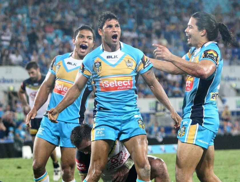 BRAD TIGHE - NRL ROUND 4 -  GOLD COAST TITANS V NTH QUEENSLAND COWBOYS AT CBUS SUPER STADIUM, 31sth MARCH 2014. This image is for Editorial Use Only. Any further use or individual sale of the image must be cleared by application to the Manager Sports Media Publishing (SMP Images). PHOTO : CHARLES KNIGHT - SMP IMAGES 