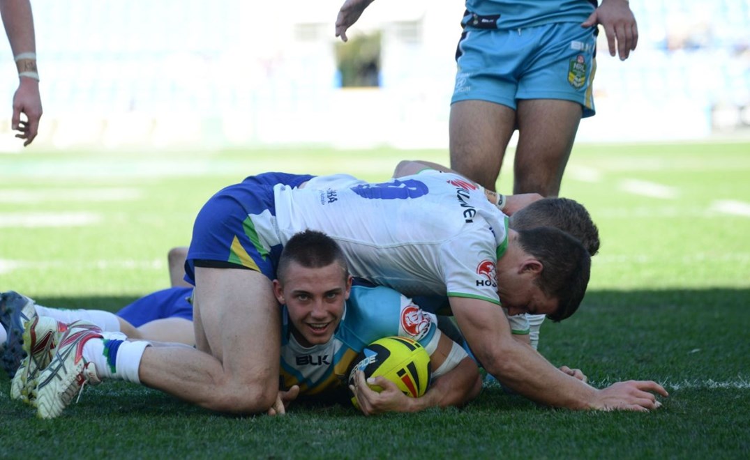KARL LAWTON - GOLD COAST -  PHOTO: SCOTT DAVIS - SMPIMAGES.COM - GOLD COAST TITANS V CANBERRA RAIDERS, 13th JULY 2014 - Action from round 18 of the NYC, between the Gold Coast Titans and the Canberra Raiders, being played at CBUS Super Stadium on the Gold Coast. This image is for Editorial Use Only. Any further use or individual sale of the image must be cleared by application to the Manager Sports Media Publishing (SMP Images). 