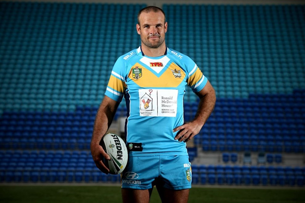 Gold Coast Titans Captain Nate Myles in the new jersey helping charities. Picture Glenn Hampson