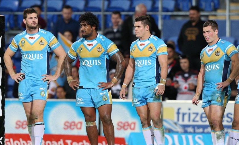 A dejected Titans team : Digital Image by Charles Knight copyright Â© nriphotos. NRL Rugby League, Gold Coast Titans v NZ Warriors at Cbus Super Stadium, Gold Coast, June 20th, 2015.