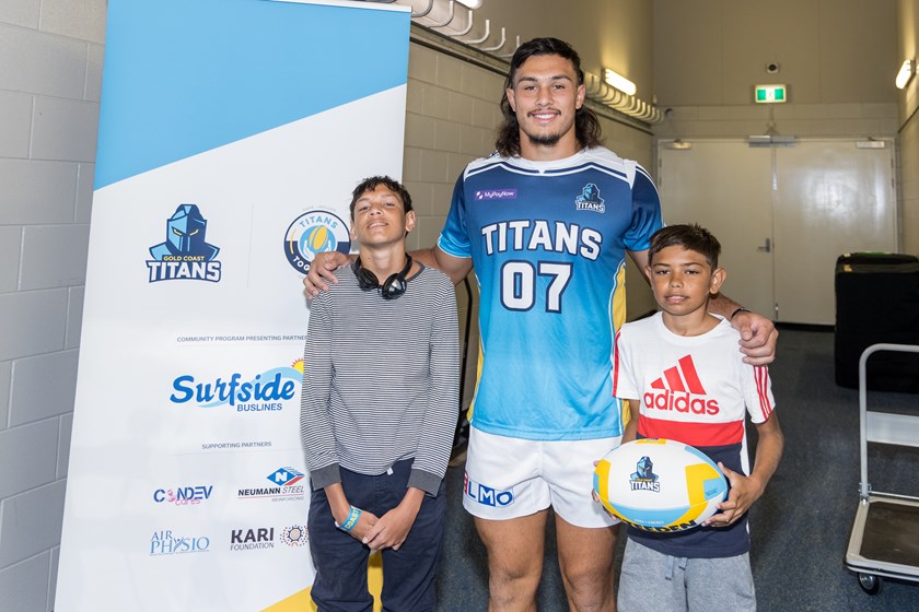 Titans Captain Tino Fa'asuamaleaui was happy to pose for a picture with the boys after the coin toss.